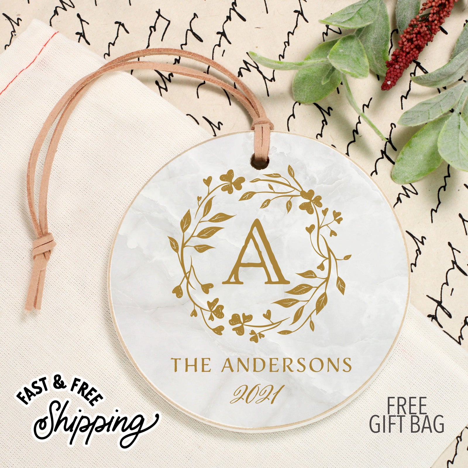 Front View. Customizable Ornament | Last Name Marble Holiday Ornaments The WAREHOUSE Studio